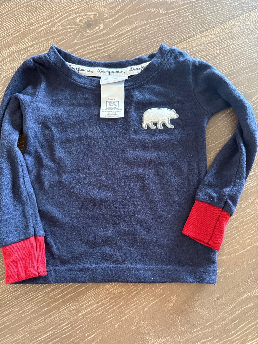 dearfoams Navy Long-Sleeve Kids Top with Red Cuffs and Bear Patch. 2T